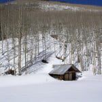 Blue Skies and Snow on red Mountain Pass